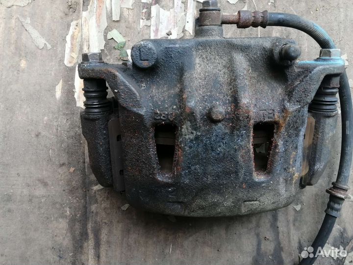 Суппорт передний левый