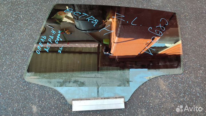 Стекло двери заднее левое Opel Astra H седан