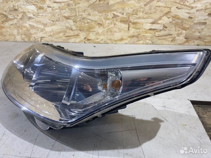 Фара галогеновая левая Citroen C4