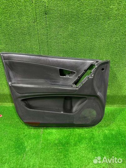 Обшивка боковой двери передняя левая Ssangyong