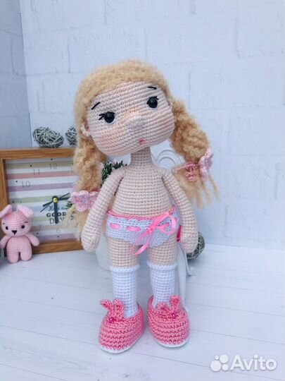 Куколка в костюме зайчика