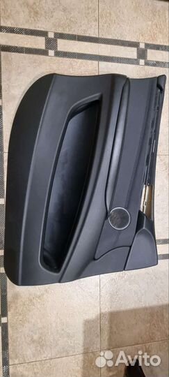 Обшивка двери Е70