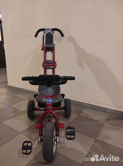 Трехколесный велосипед с ручкой б/у