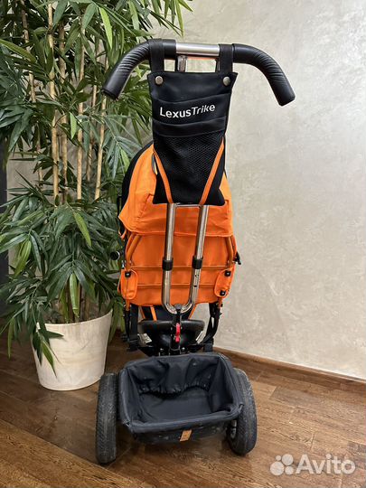 Трехколесный велосипед с ручкой