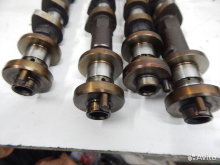 Распредвал Nissan VQ20