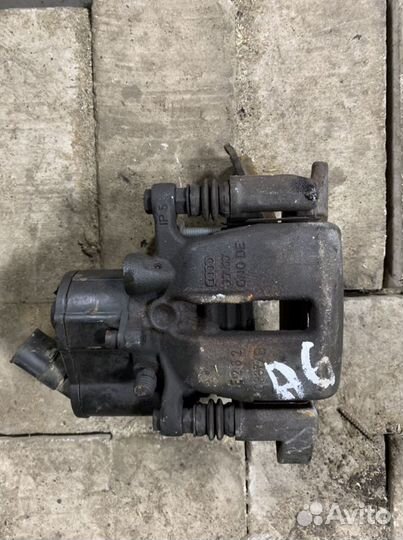 Суппорт задний левый Ауди А6 С6