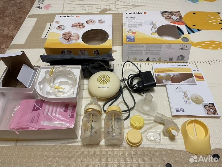 Молокоотсос Medela swing + calma