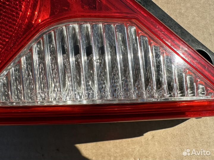 Фонарь задний левый Kia Spectra
