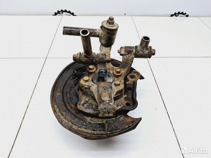 Кулак поворотный задний левый Chevrolet Lacetti