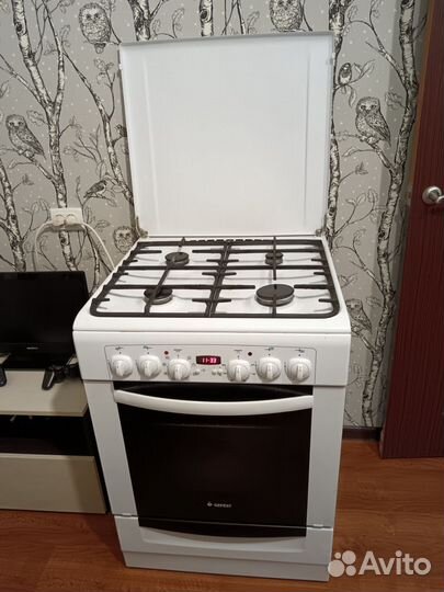 Газовая плита с электрической духовкой 