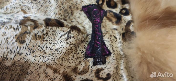 Меховая жилетка