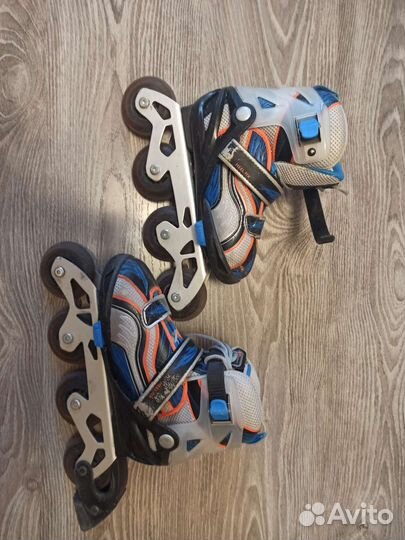 Роликовые коньки