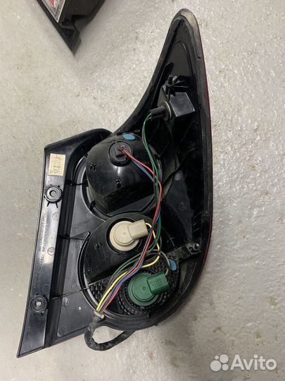 Фонарь левый задний Chevrolet Aveo T300