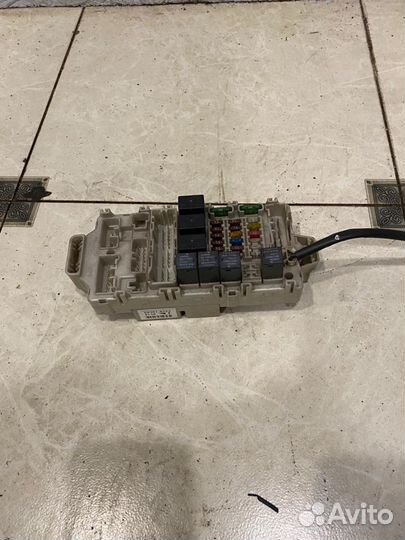 Блок предохронителей в салоне Mitsubishi Lancer 9