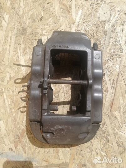 Суппорт задний левый Volkswagen Touareg