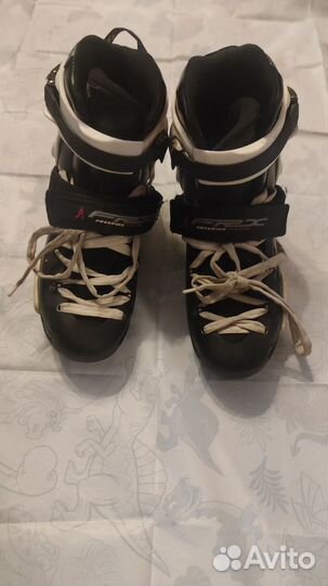 Роликовые коньки