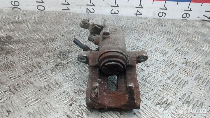 Суппорт тормозной задний левый Volkswagen Golf