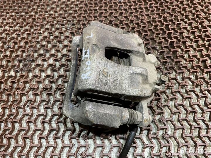 Суппорт передний левый Рио 3 Kia Rio