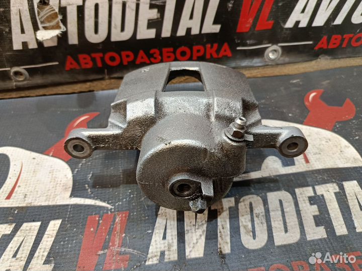 Суппорт передний Chevrolet Lacetti J200