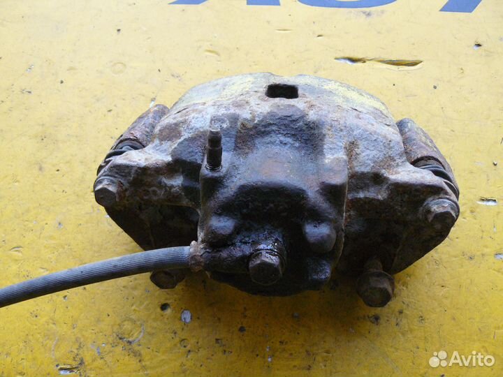 Суппорт передний левый для Mitsubishi Lancer 9