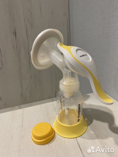 Молокоотсос medela ручной