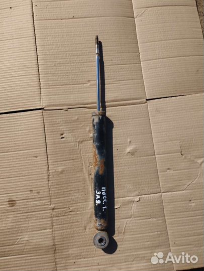 Амортизатор задний Nissan Note 1 (E11)