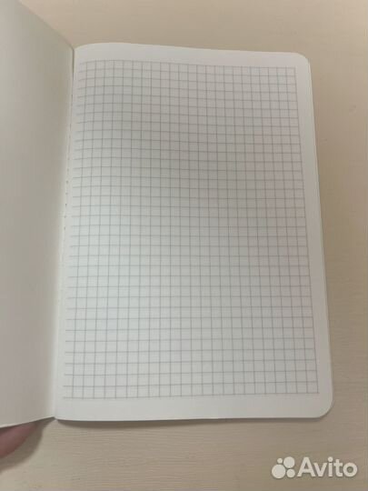 Тетрадь новая в клетку