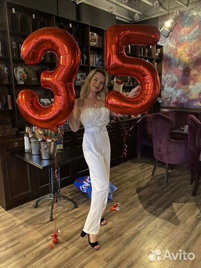 Комбинезон с перьями