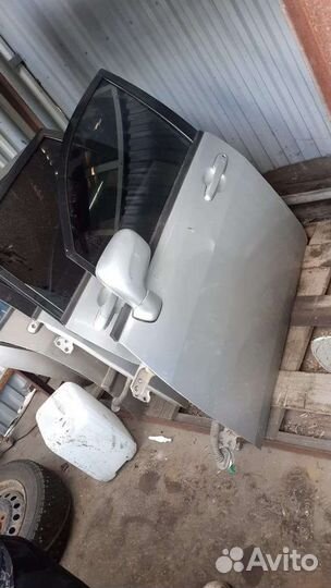 Дверь передняя левая Suzuki liana 2001 2007