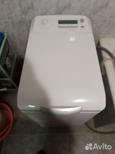 Стиральная машина с вертикальной загрузкой