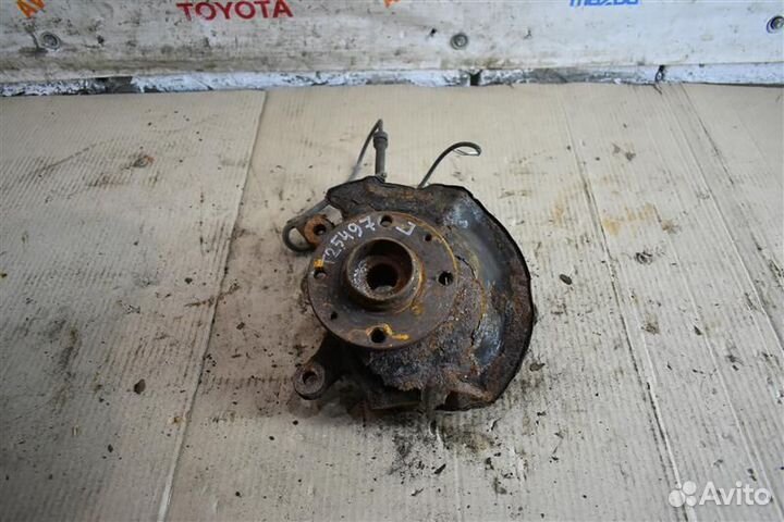 Кулак поворотный передний левый Suzuki Swift 3