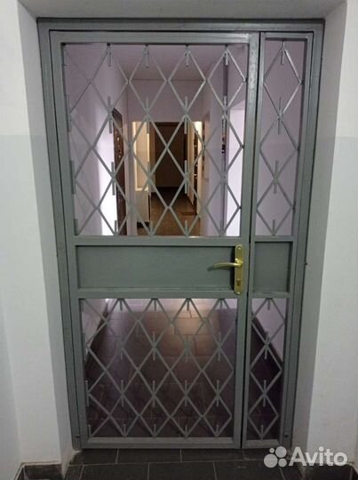 Дверь металлическая решëтка