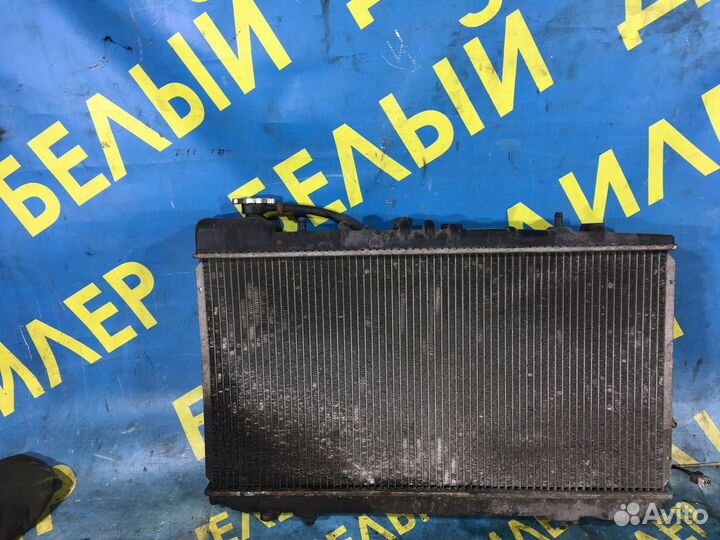 Радиатор диффузор Nissan Primera P10