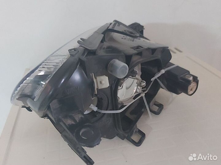 Фара левая peugeot 206