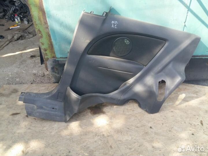 Обшивка салона правая Opel Corsa D 2006-2015