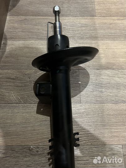 Стойка амортизационная перед лев