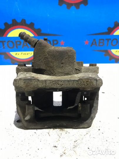 Суппорт передний левый Renault Logan 1