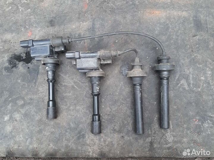 Катушка зажигания Мицубиси Лансер 1,6i