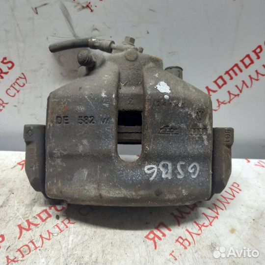 Суппорт тормозной передний правый Volkswagen Golf