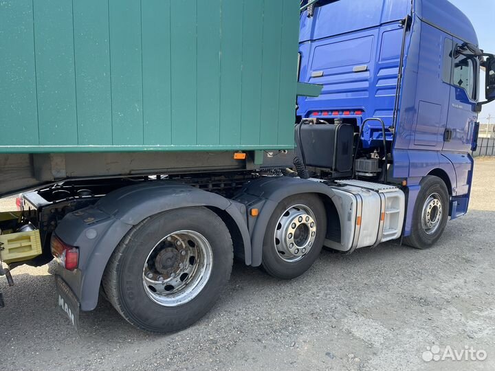 MAN TGX 26.480 с полуприцепом, 2012