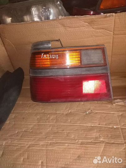 Фонарь левый Mazda Capella