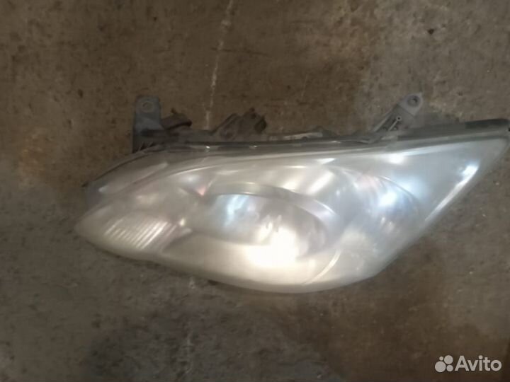 Фара левая Тойота Королла Е120 хэтчбек