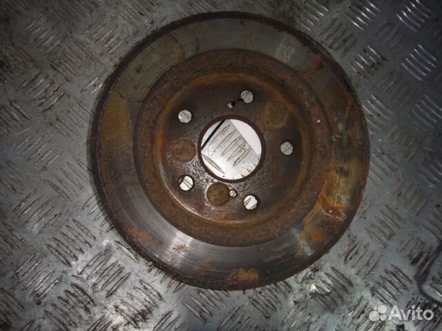 Диск тормозной Auris (07-12) /Corolla 150 (06-13) зад б\у (арт. 4243112260)