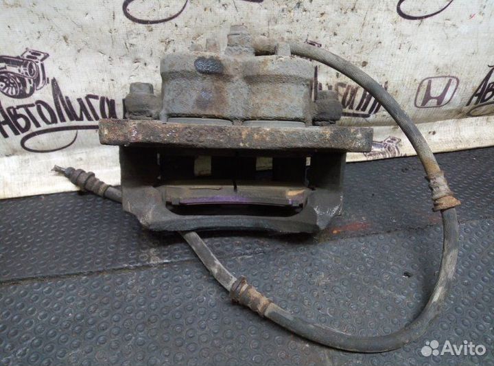 Суппорт передний левый Mitsubishi Pajero 4 6G72