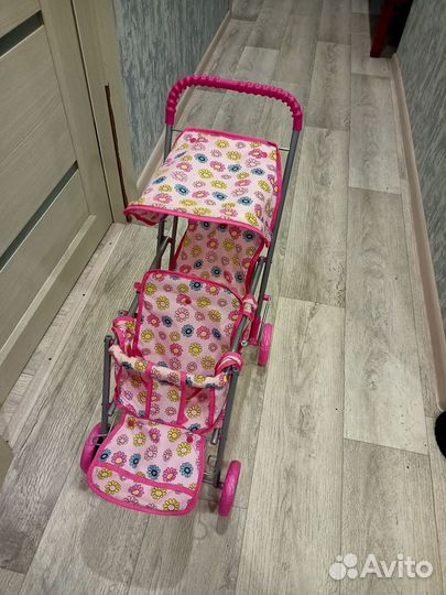 Игрушечная коляска для кукол