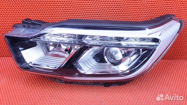 Фара левая SsangYong Rexton POE D22DTR 83101-36000