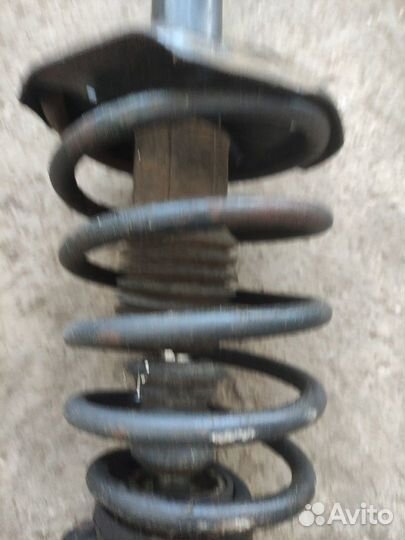 Стойка передняя Mazda Capella