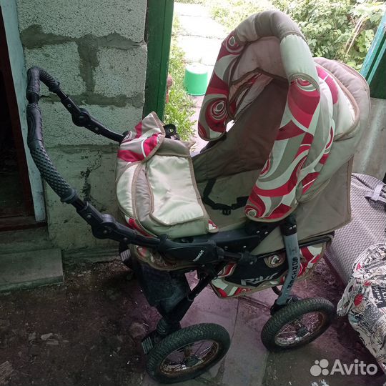 Прогулочная коляска с перекидной ручкой бу