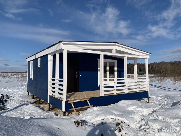 Дачная каркасная бытовка с террасой