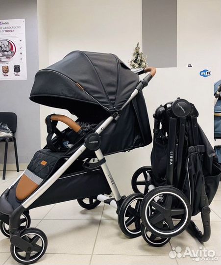 Прогулочная коляска на больших колёсах